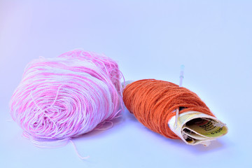 knitting wool on white background