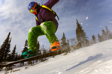 Snowboarder jumping