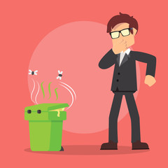 businessman disgusted by full trashcan