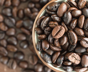 Top view coffee beans in coffee cup