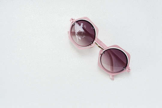 isolated woman pink creative designed sunglasses