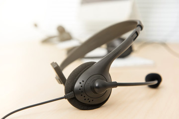 Microphone headset on the table in call center
