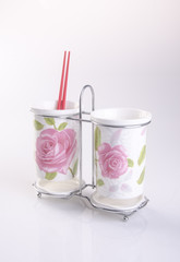 Kitchen utensils holder or Cutlery holder on background.