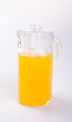 Orange juice in glasses on white background.