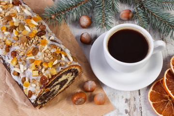 Obraz na płótnie Canvas Poppy seeds cake, cup of coffee and spruce branches, dessert for Christmas