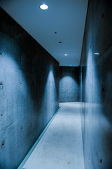 Clear concrete corridor with beautiful lighting.
