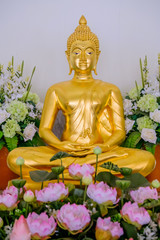  Detail of Buddha gold statues decorating the Buddhist temple  in Udon Thani ,Thailand. Photo taken on: 10 November , 2016