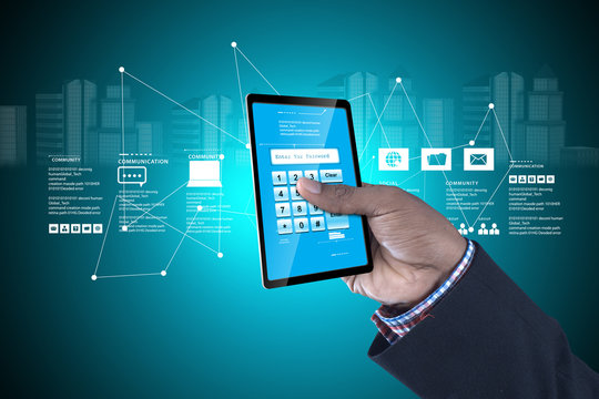 Man showing tablet pc in colour in color background