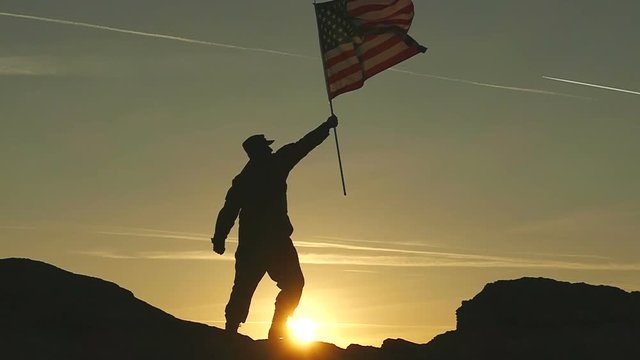 Soldier and American Flag. Democracy symbol in Slow Motion 