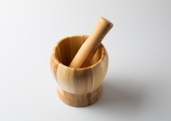 Close-Up Of Mortar And Pestle on the table.