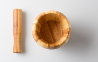 Close-Up Of Mortar And Pestle on the table.