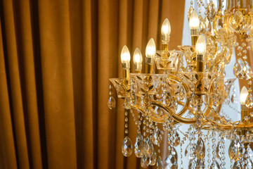 Close-up chrystal chandelier with copy space