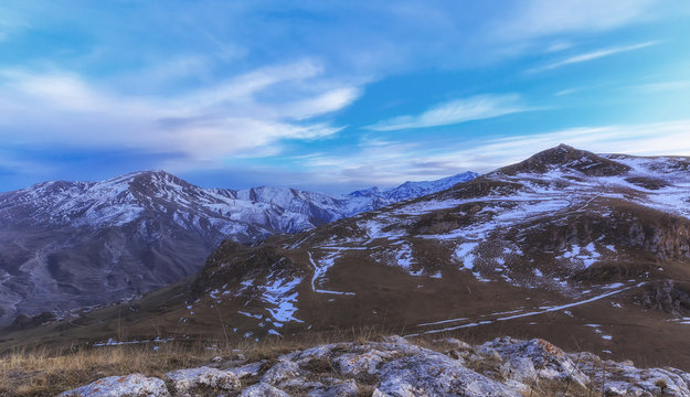 Snow-covered mountains around Cek village at sunset.Azerbaijan