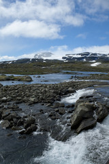 river and snowy mountain panorama