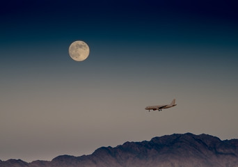 Super moon and landing airplane