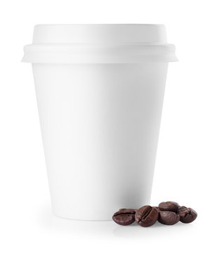 disposable coffee cup with coffee beans isolated on white