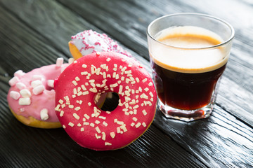 Colorful donuts and coffee