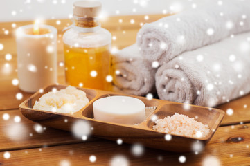 soap, himalayan salt, scrub in bowl, towel and oil