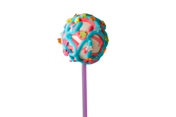 Ball-shaped dessert with frosting. Colorful cake lollipop. Tasty surprise for birthday kid. Try the flavor of holiday.