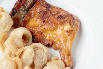 Streaky pork with crispy crackling and Grilled chicken leg . close-up. horizontal view from above. Thai Food