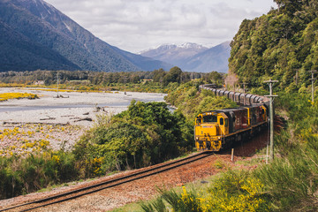 A kiwi train crossing  Otira near Otira Highway, New Zealand