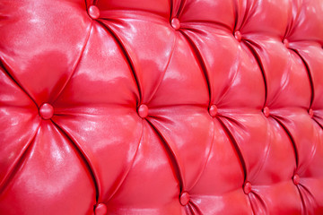 Red upholstery fabric texture, background 