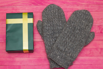 green gift box  and mittens