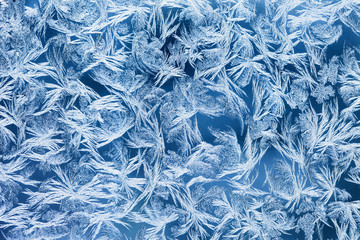 Winter background, frost on window. Frosted glass
