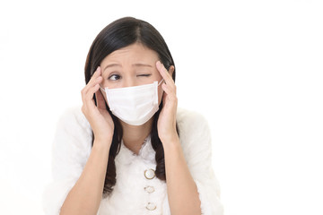 風邪に罹患した女性