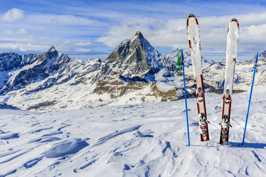 Ski Equipment with panoramic view of Matterhorn on a clear sunny