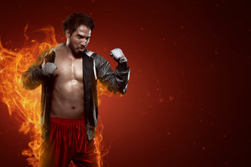 Fototapeta na wymiar Portrait of muscular asian male boxer