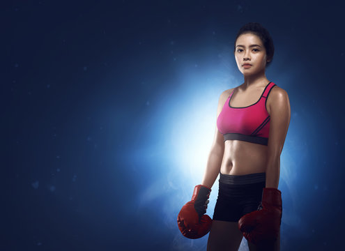 Beautiful asian woman boxer portrait