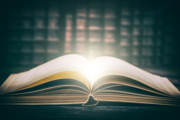 Old book wooden library desk concept.