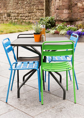 Fototapeta na wymiar Garden table and chair on patio
