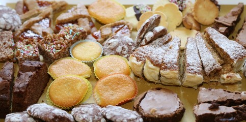 pastries and tasty slices of cake for sale