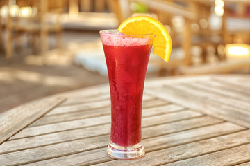 Fruit smoothie on wooden table