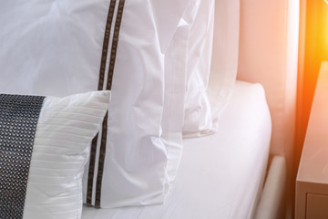 Bed maid-up with clean white pillows