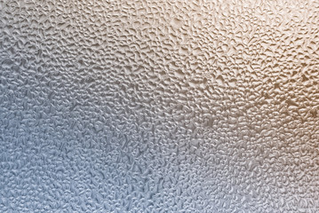misted glass with drops water background