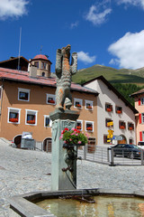 Fountain with bear in Zuoz, village in Engadine Switzerland, Europe