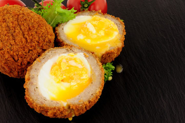 Scotch Eggs On A Slate Background