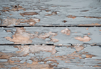 old shabby wooden planks with peeling paint