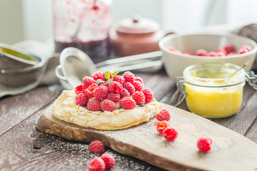 Pavlova Dessert with Lemon Curd and Raspberries