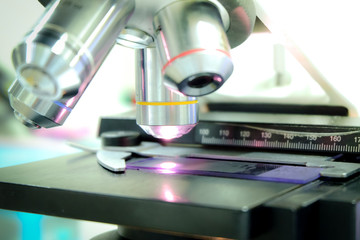 Blurred microscope on over white tone.