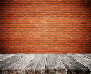 Wood plank tabletop, with defocus brick white wall texture background