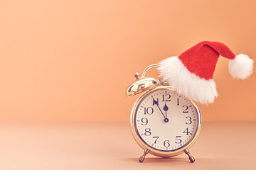 New Year background decoration Handmade, Christmas holiday Gold Alarm Clock, Santa hat, Happy New Year 2017. XMAS Design Ornament. Festive Art christmas Greeting Card. Retro Vintage