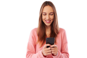 Fototapeta premium Exhilarated teenager reading pleasant text message on mobile pho