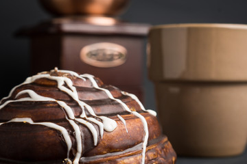 Fresh bun on the rustic wooden background. Selective focus.