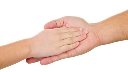 Children's hand in a man's palm
