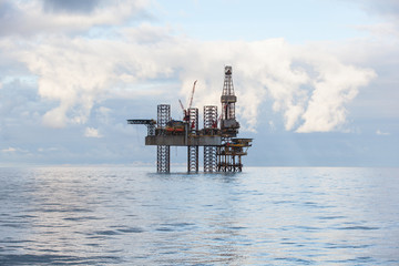Oil and gas jack up drilling rig in the ocean sea from oil and gas industrial petroleum. This rig...