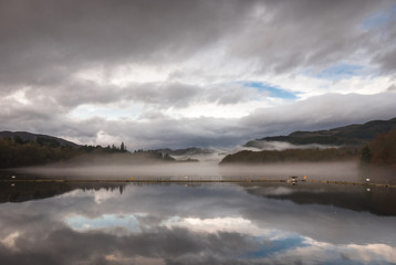 Obraz premium Mist lying over Loch Faskally, Pitlochry, Scotland